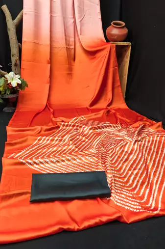 Orange printed satin saree with blouse piece