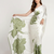 Green printed satin saree with blouse piece