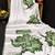Green printed satin saree with blouse piece