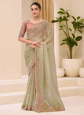 pista green faux tissue embroidered saree 1