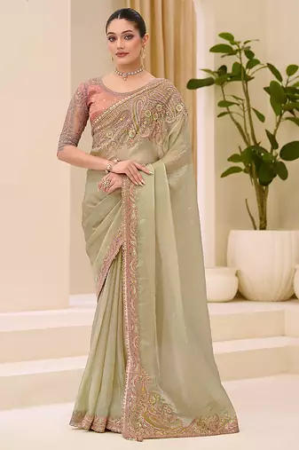 pista green faux tissue embroidered saree