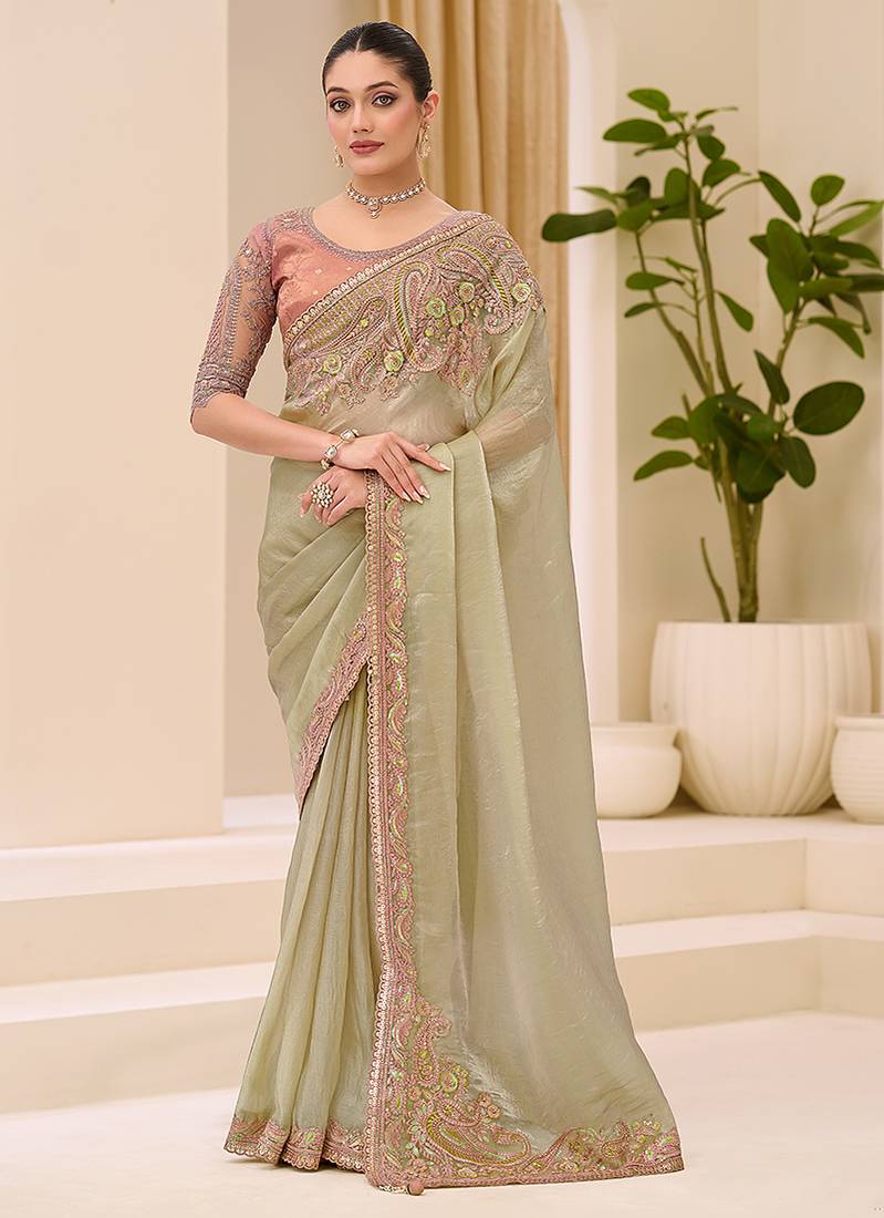 pista green faux tissue embroidered saree