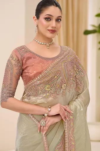 pista green faux tissue embroidered saree