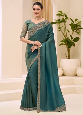 teal green faux tissue embroidered saree 1