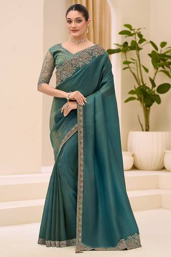 teal green faux tissue embroidered saree