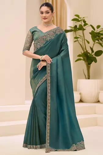 teal green faux tissue embroidered saree