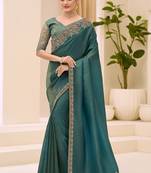 teal green faux tissue embroidered saree
