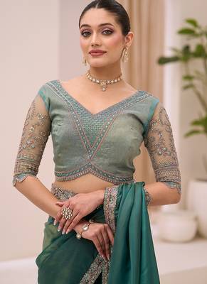 teal green faux tissue embroidered saree 3
