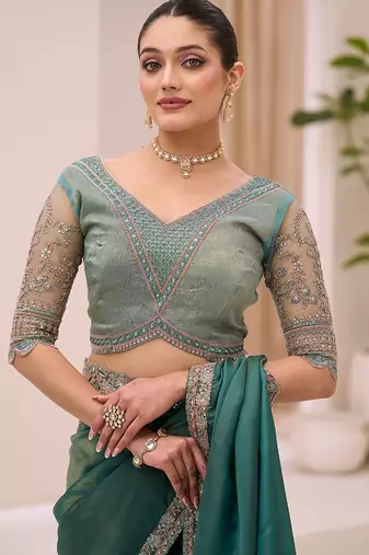 teal green faux tissue embroidered saree