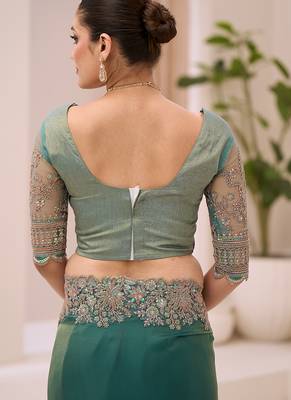 teal green faux tissue embroidered saree 4