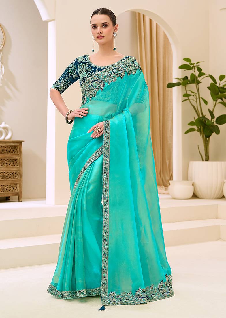 turquoise blue faux georgette embroidered saree