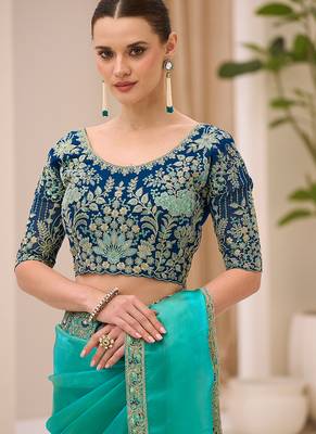 turquoise blue faux georgette embroidered saree 3