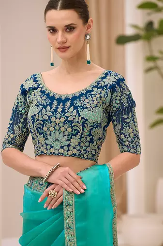turquoise blue faux georgette embroidered saree
