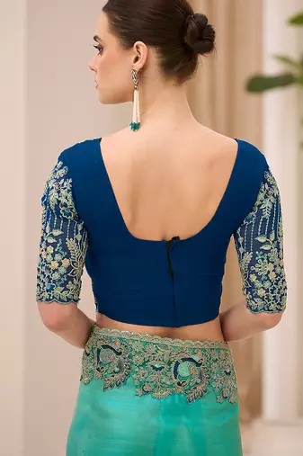 turquoise blue faux georgette embroidered saree