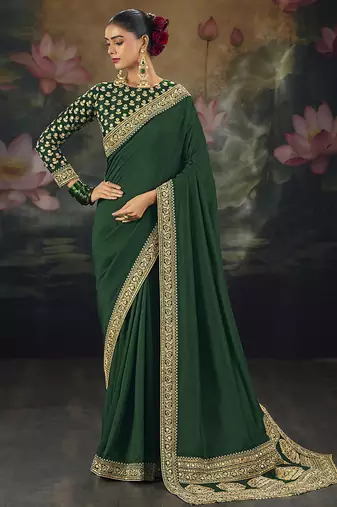  green embroidered green silk blend saree