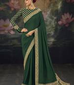  green embroidered green silk blend saree
