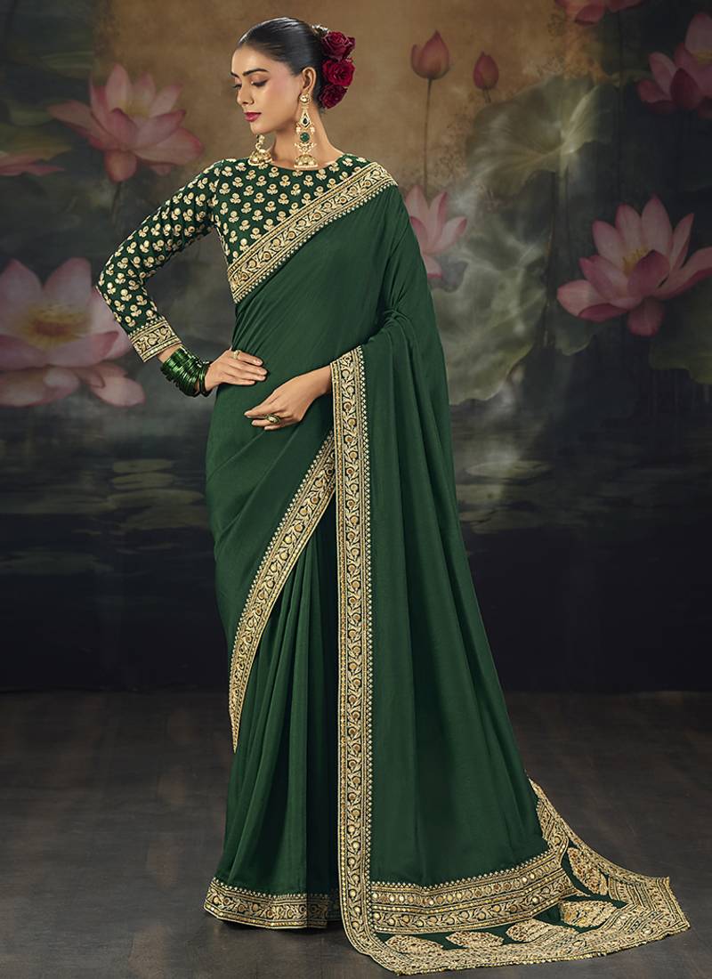  green embroidered green silk blend saree