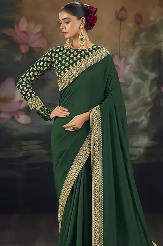  green embroidered green silk blend saree