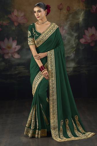  green embroidered green silk blend saree
