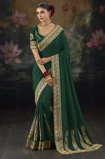  green embroidered green silk blend saree