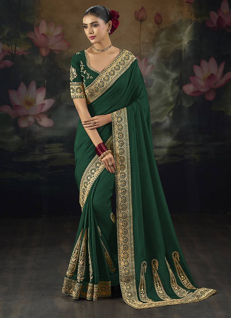  green embroidered green silk blend saree