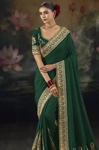  green embroidered green silk blend saree