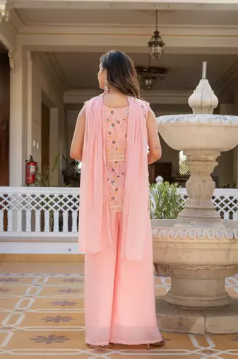 Women peach embroidered star georgette kurta palazzo set with dupatta