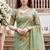 green woven cotton saree with blouse