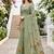 green woven cotton saree with blouse