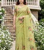 green woven cotton saree with blouse