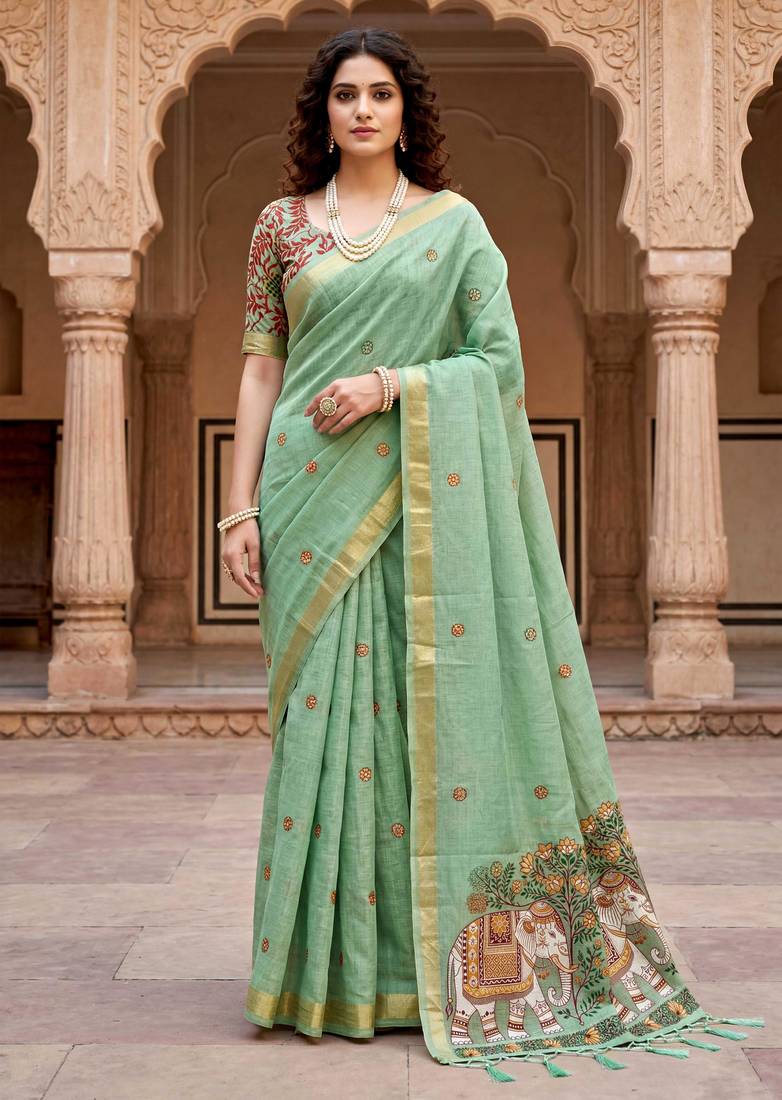 green woven cotton saree with blouse