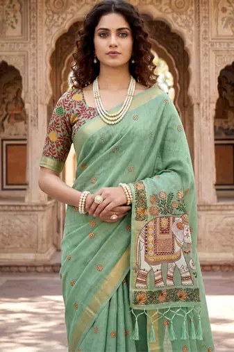 green woven cotton saree with blouse