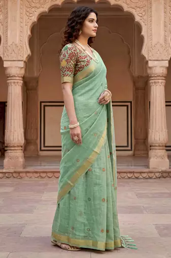 green woven cotton saree with blouse