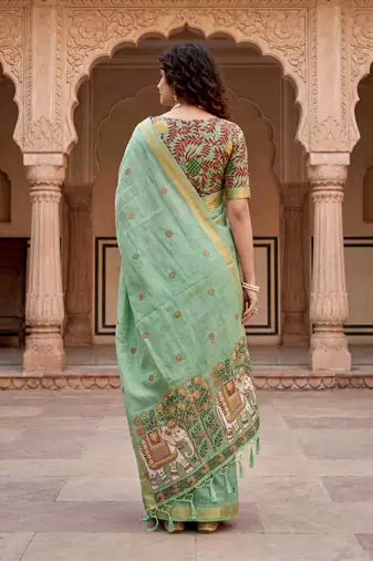 green woven cotton saree with blouse
