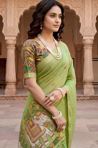 green woven cotton saree with blouse