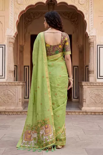 green woven cotton saree with blouse