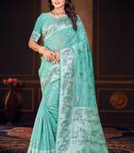 green woven cotton saree with blouse