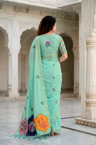 green woven cotton saree with blouse