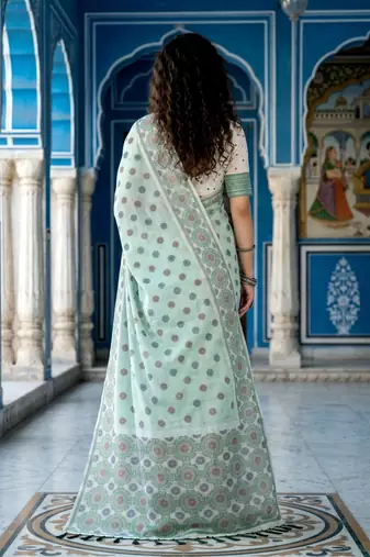 green woven cotton saree with blouse