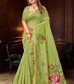 green woven cotton saree with blouse