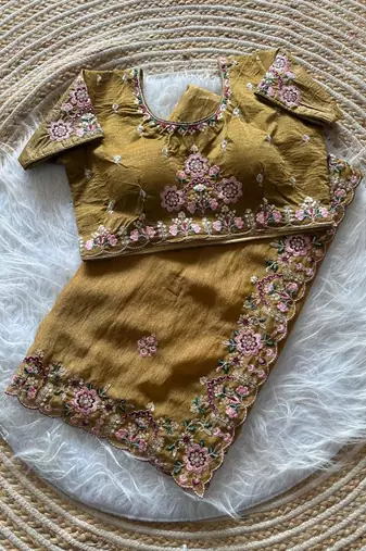 yellow embroidery sequin and multi border silk saree