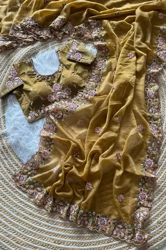 yellow embroidery sequin and multi border silk saree