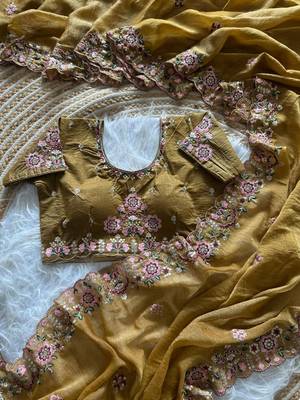 yellow embroidery sequin and multi border silk saree 4