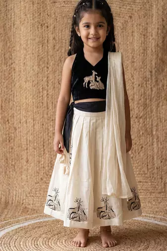 New latest kids off-white silk lehenga with black velvet choli & deer embroidery motif