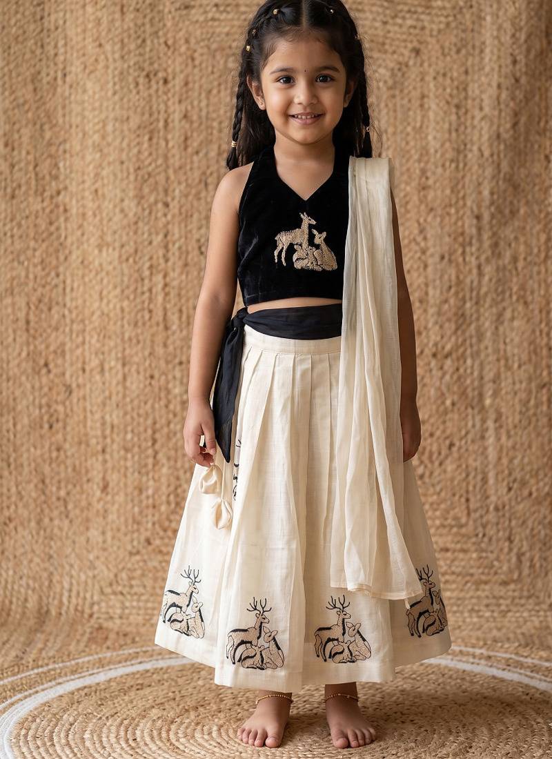 New latest kids off-white silk lehenga with black velvet choli & deer embroidery motif