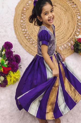 Latest designer girls royal purple silk pattu pavadai lehenga choli set with brocade koti