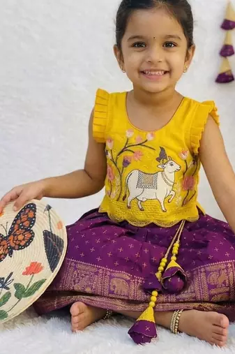 Kids latest collection girls yellow & wine purple pattu pavadai lehenga set with ruffle sleeves