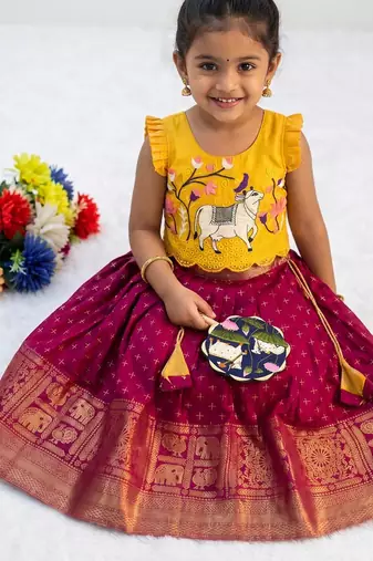 New trendy designer kids girls yellow & red silk pichwai cow motif lehenga choli set