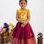 New trendy designer kids girls yellow & red silk pichwai cow motif lehenga choli set