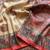 cream-red printed pasmina print with dori silk saree